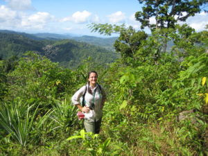 Cullman on her way to investigate the vegetation on a Malagasy farmer's land.