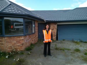 Liquefaction during earthquakes turns solid ground into a liquid, making buildings like this house in Christchurch, New Zealand, sink into the soil.