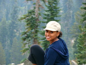 Carnivore Ecologist Rae Wynn-Grant, hiking through the Sierra Nevada mountain range.
